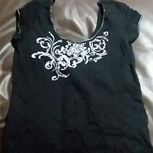 Guess bling t .Tag says L but is def med.